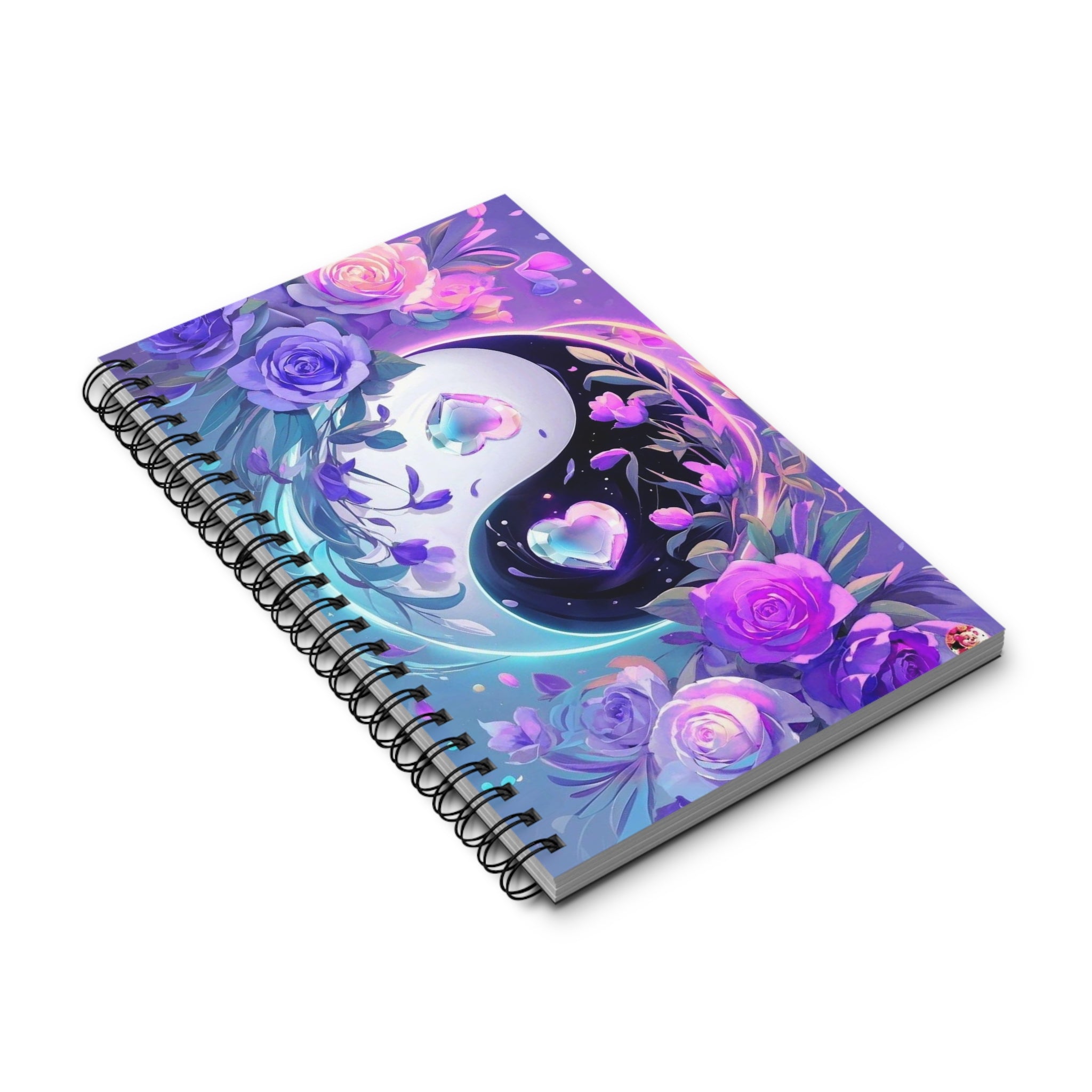 Quaderno a spirale con copertina illustrata floreale viola e rosa, angolazione obliqua