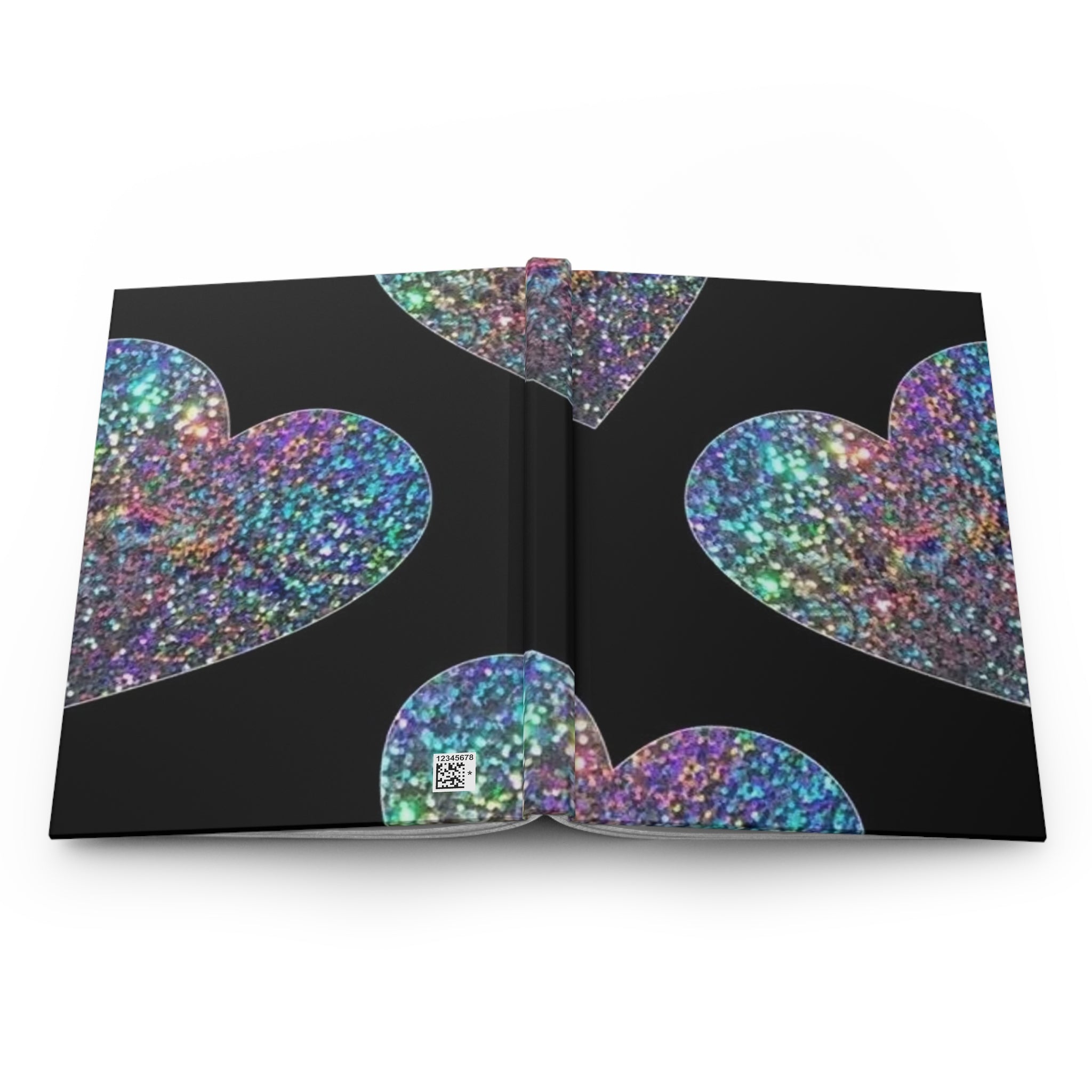 Diario rigido opaco aperto con cuori glitter multicolore sulla copertina interna