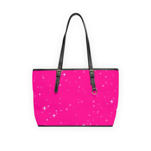 Borsa a tracolla in ecopelle fucsia con stelle, manici e tracolla neri.