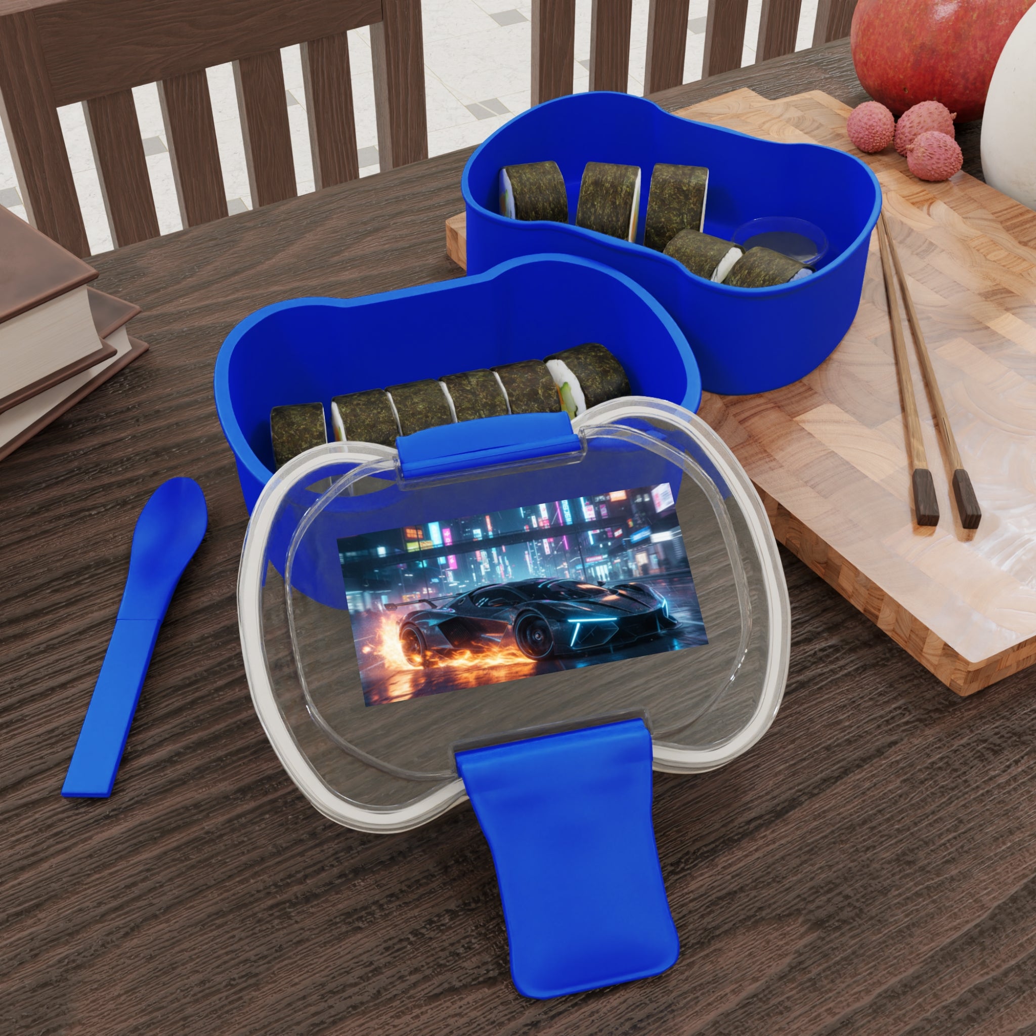 Contenitore bento a due scomparti blu con separatore e due scomparti con cibo