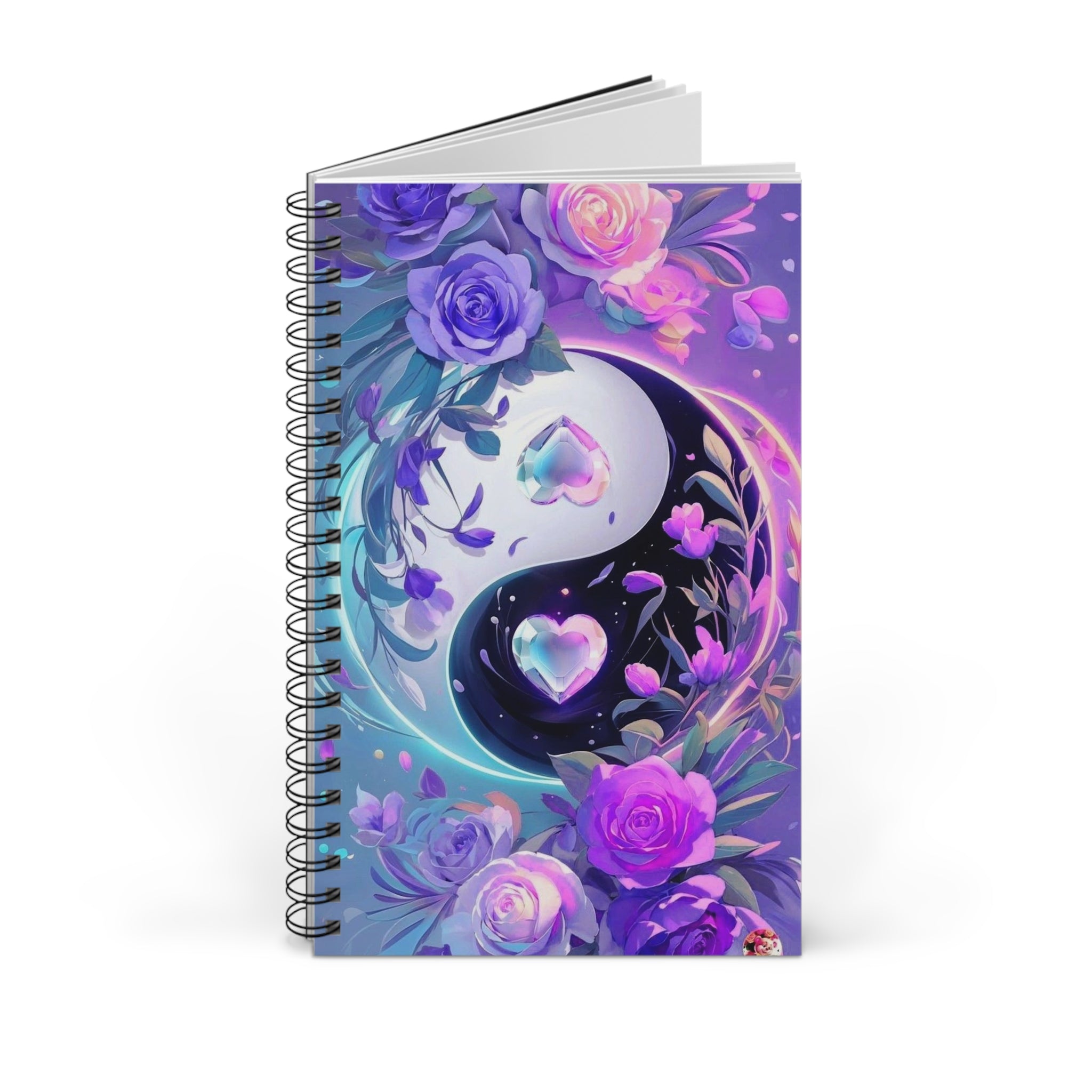 Quaderno a spirale con copertina illustrata floreale viola e rosa, vista laterale