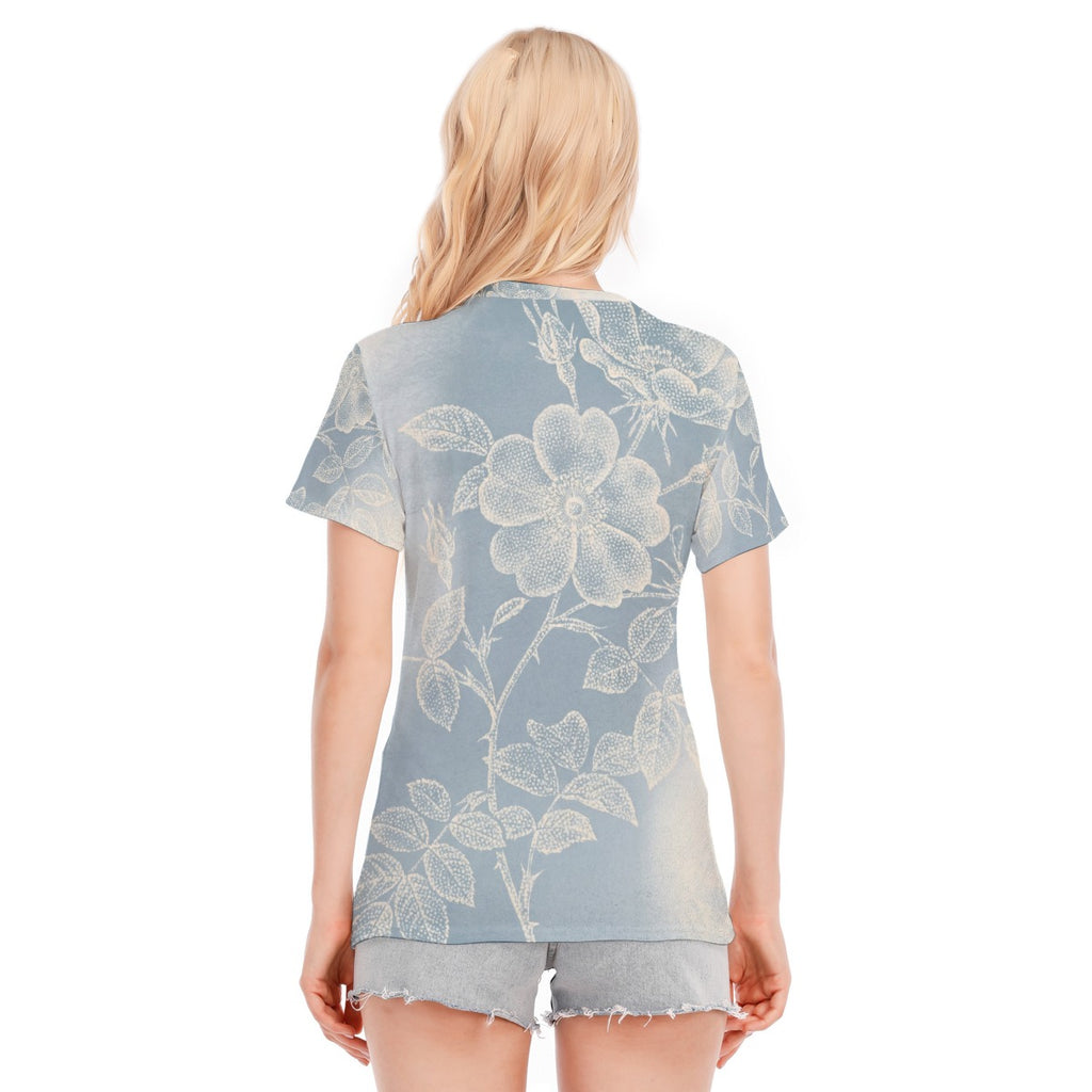 Maglietta donna azzurra con stampa floreale sul retro, girocollo e maniche corte.