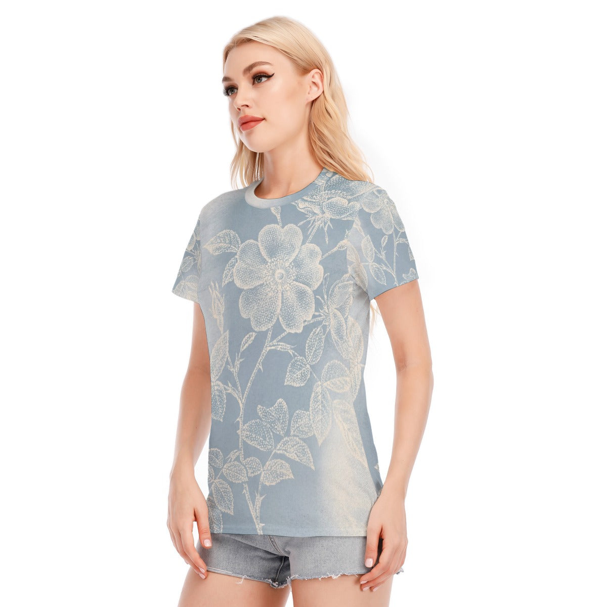 Maglietta donna azzurra con stampa floreale sul davanti, girocollo e maniche corte.