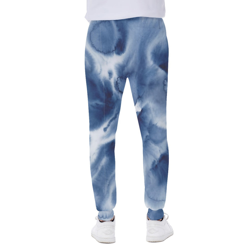 Pantaloni uomo blu con stampa nuvola, fondo con polsino elasticizzato.