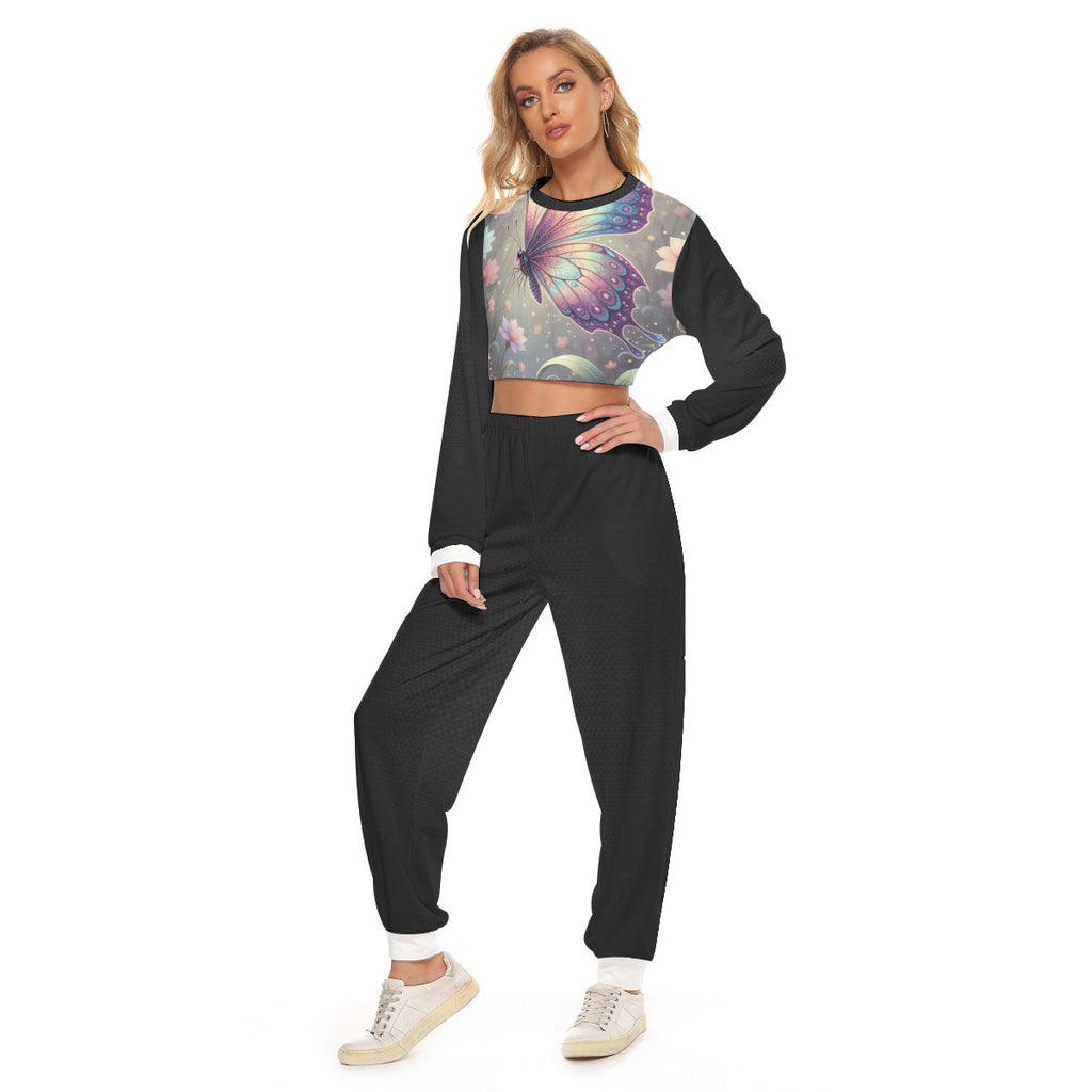 Tuta da donna con top cropped fantasia floreale e pantaloni neri, vita elasticizzata