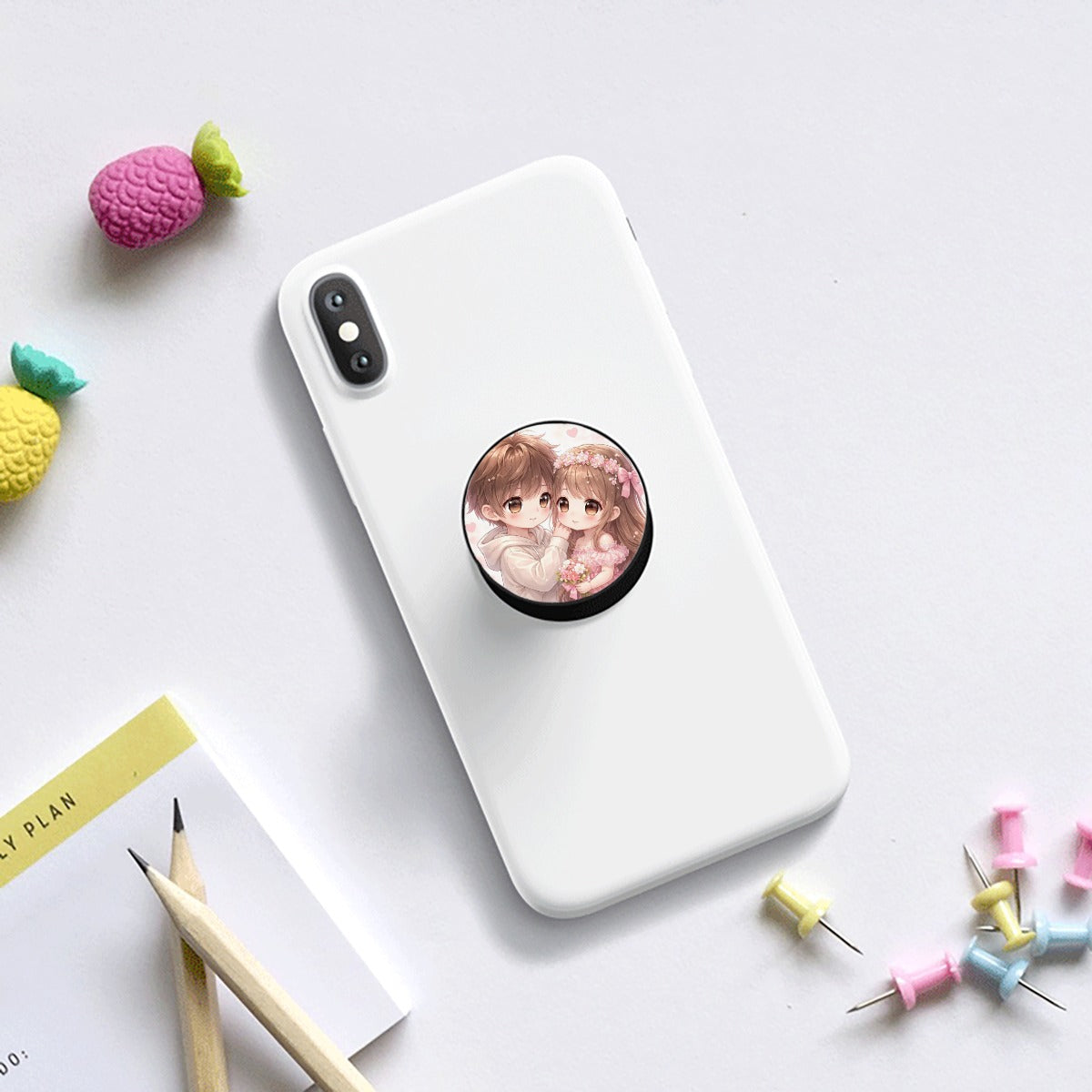 Supporto airbag per telefono cellulare su telefono bianco: disco rotondo con grafica anime