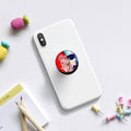 Supporto per telefono bianco con staffa circolare e grafica colorata