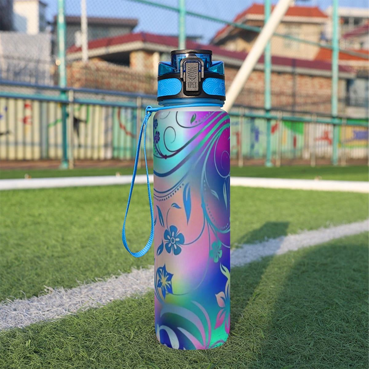 32 oz spor su şişesi, mavi kapaklı, mavi-mor çiçek desenli renk geçişli matara