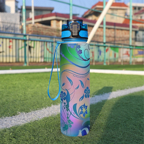32 oz spor su şişesi, mavi kapaklı, pastel çiçek desenli renk geçişli matara