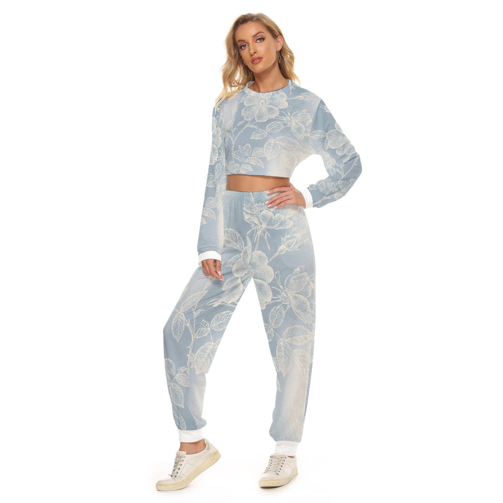 Tuta donna azzurro chiaro a fiori, felpa crop con pantaloni jogger e bordo vita